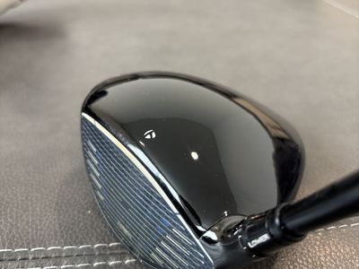 Qi10 Driver, 9.0, used 10 times, HZRDUS Smoke x-stiff shaft.