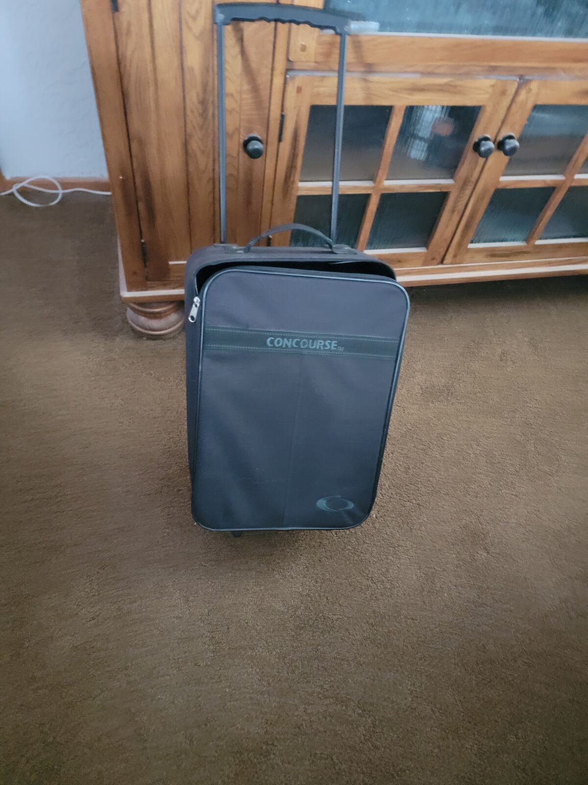 CONCOURSE ROLLING CARRY ON SUITCASE