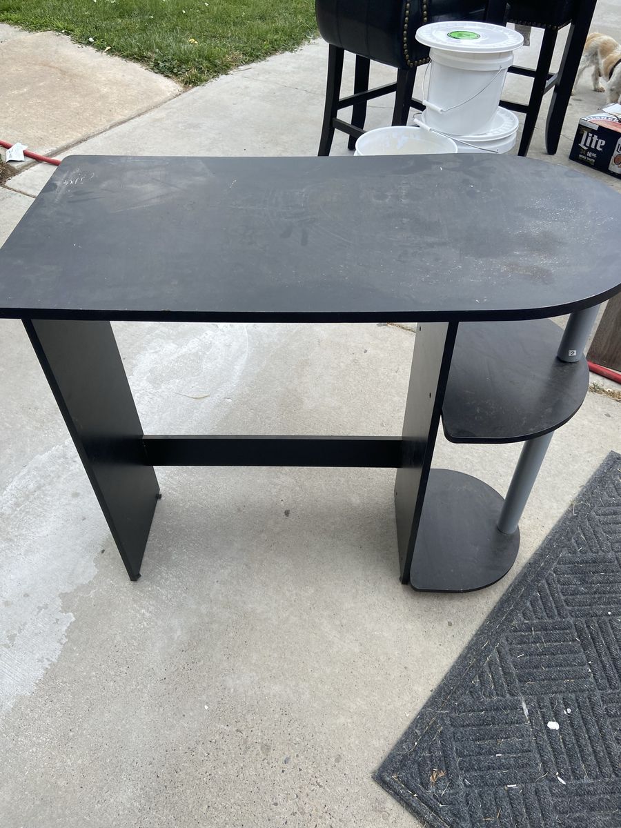 I have 2 computer desks available. Black one & Gray one. Computer Desk with Keyboard Tray & Shelves - $40 each