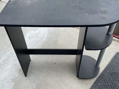 I have 2 computer desks available. Black one & Gray one. Computer Desk with Keyboard Tray & Shelves - $40 each