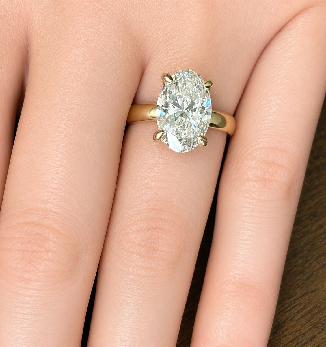 Oval Cut Diamond Solitaire Ring in Yellow Gold