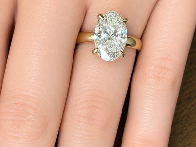Oval Cut Diamond Solitaire Ring in Yellow Gold