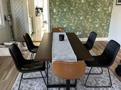 Dark Wood Extendable Dining Table with Black Metal Legs and Full Six Seat Set