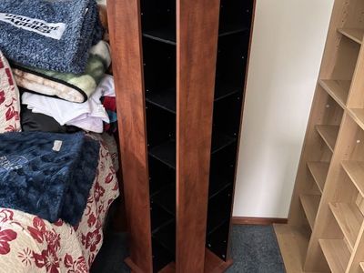Rotating Media Tower Shelving Unit in Cherry Wood Finish