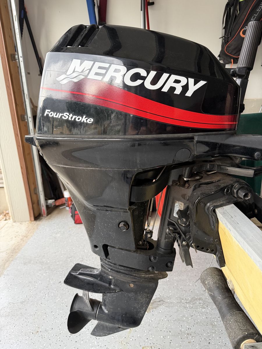 Buy gently used Mercury 15 hp 4 stroke motor and get Sears Gamefisher fishing boat & trailer free.