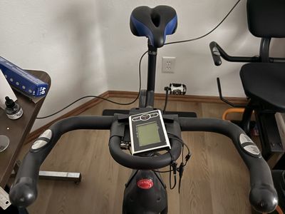 RAVS Stationary Exercise Bike with Digital Monitor and Adjustable Seat