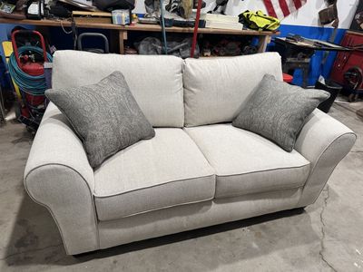 Comfortable 2-Seater Sofa with Decorative Throw Pillows - Light Beige Upholstery