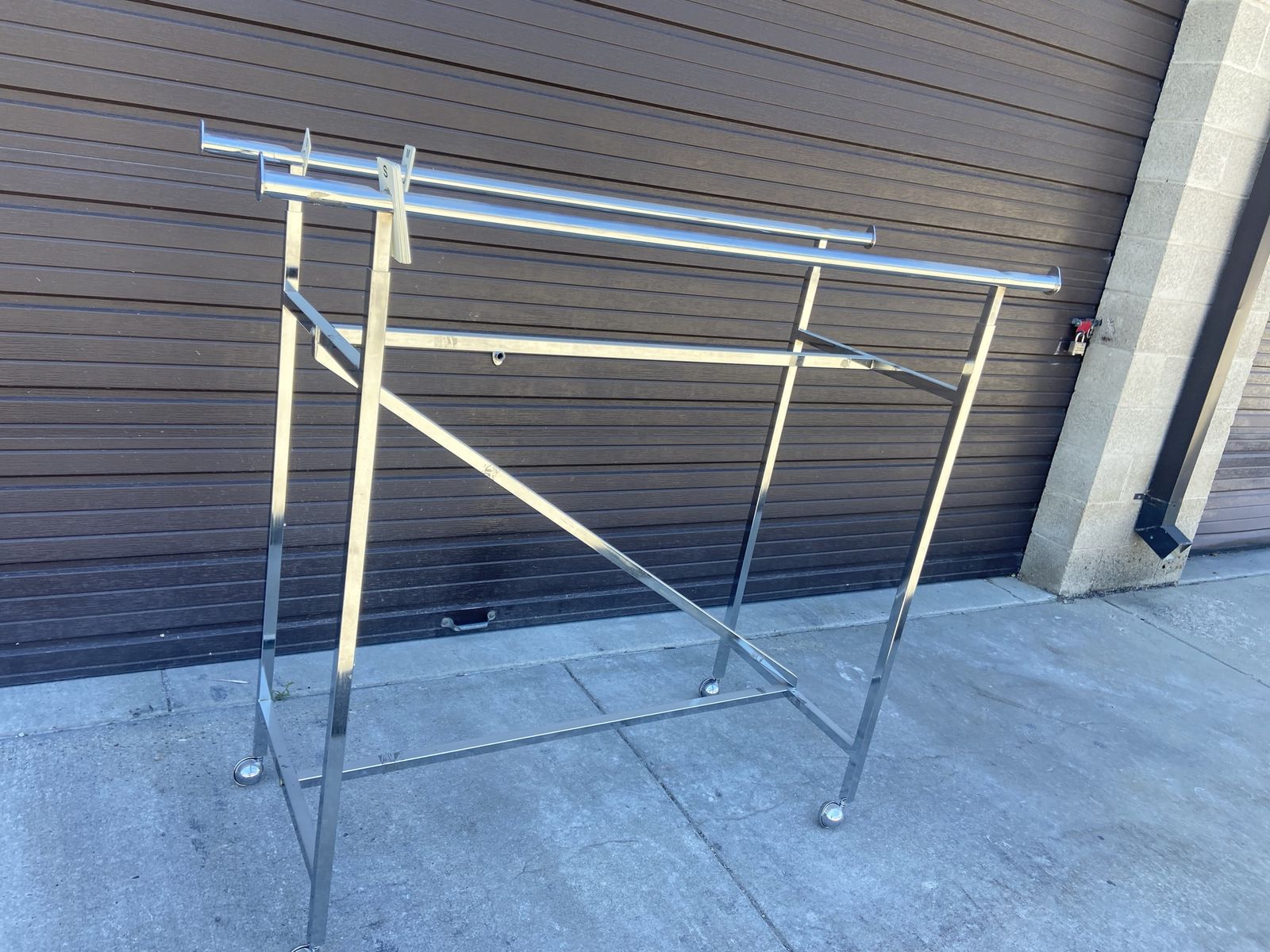 Clothing Rack featuring a heavy-duty steel Z-brace I have 7 racks