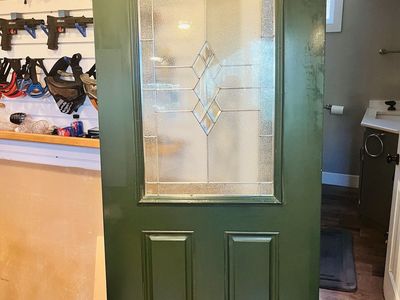 Brand new metal Green Entry Door with Glass Insert - 36" x 80". Can be drilled for either side.