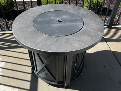 Round Propane Outdoor Fire Pit Table with Wood Grain Top and Lid “ New Never Used “