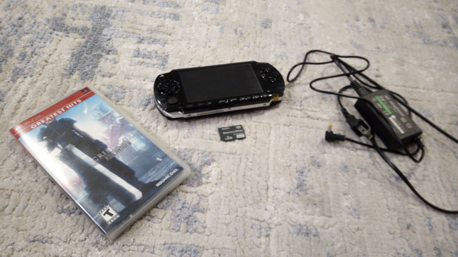 Sony PlayStation Portable PSP-1001 2GB - Black / Cleaned/New Housing Shell/WORKS