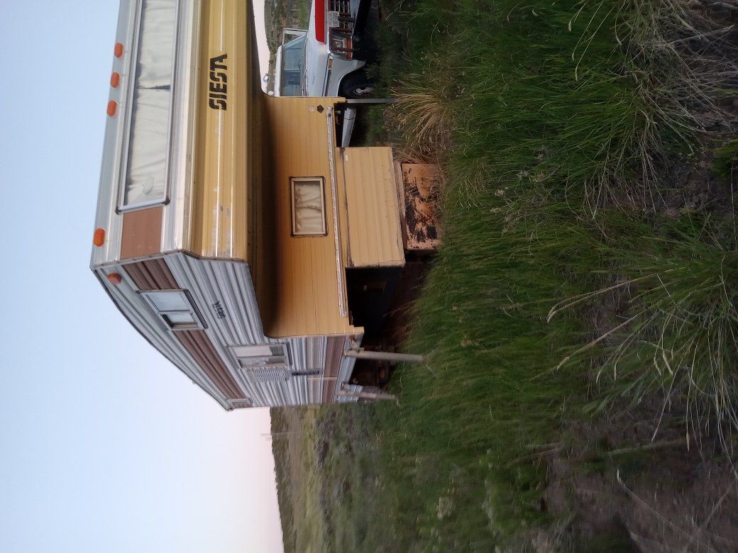 About a 11 foot cab over Camper