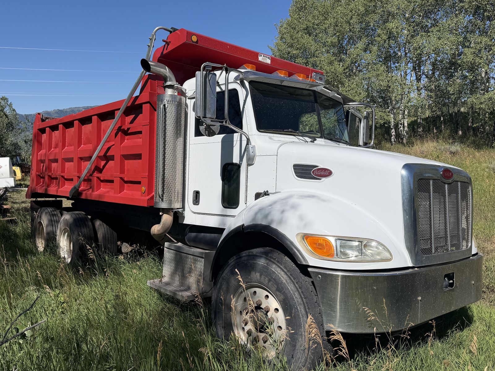 Peterbilt Dump Truck Model 335 White and Red