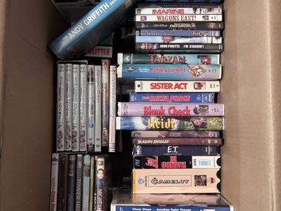 A Box of various movies in DVD and VHS