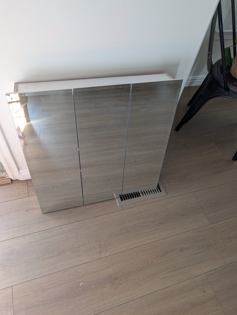 Bathroom wall mirror cupboard