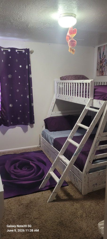 3 bed bunk bed with 3 mattresses,dresser,rug,sheets and curtains
