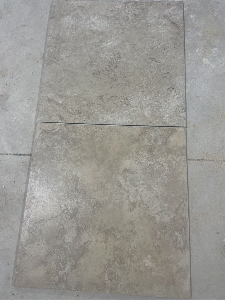 20"x20" ceramic floor tile, aprox. 130 sq. ft.