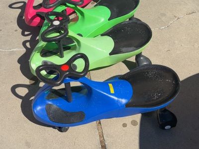 Set of 4 plasma Wiggle Cars - red Green, and Blue Kids Ride-On Toys