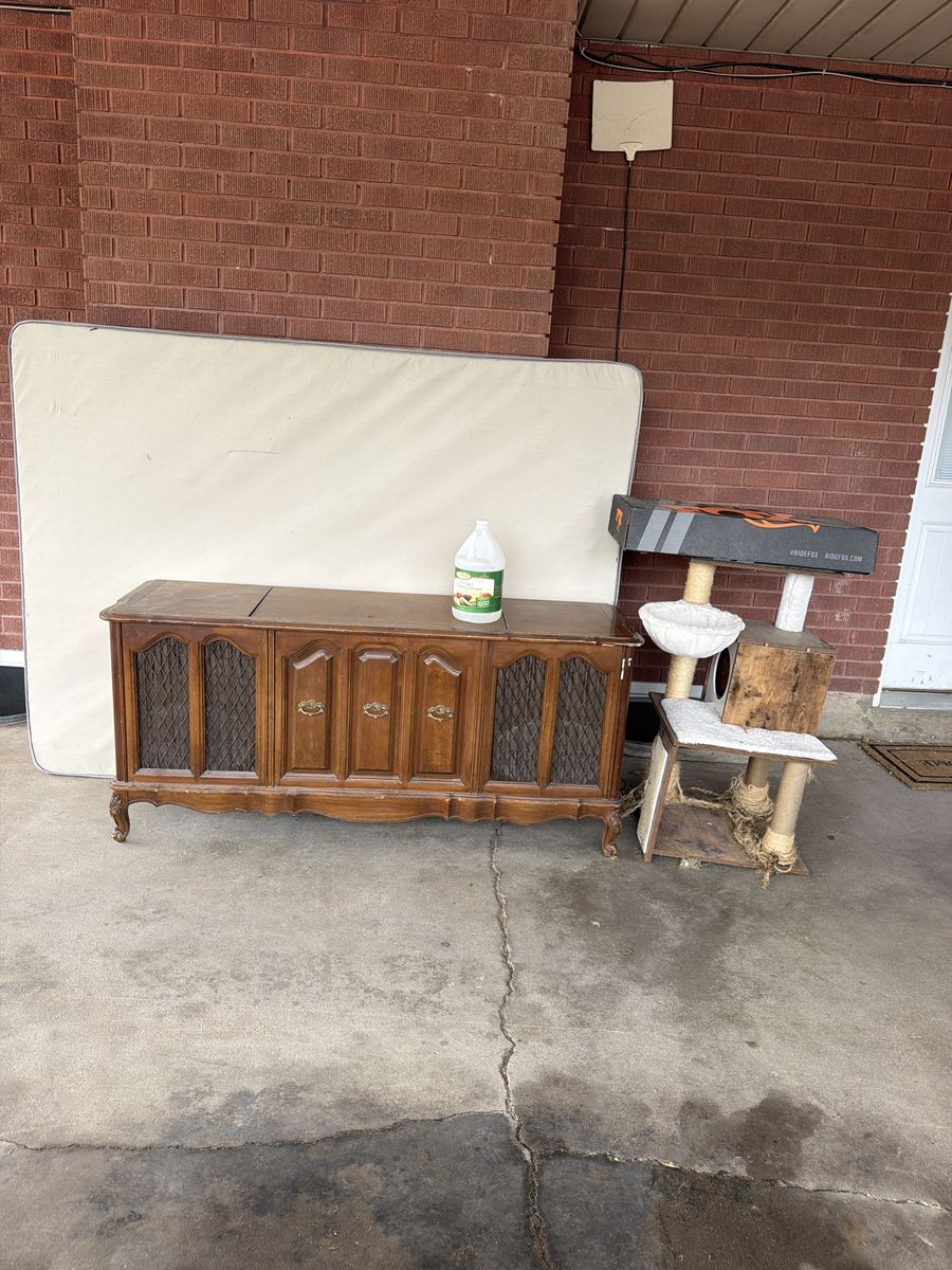 Free cat tower, and brand new box spring, used snowmobile shocks also many other free items