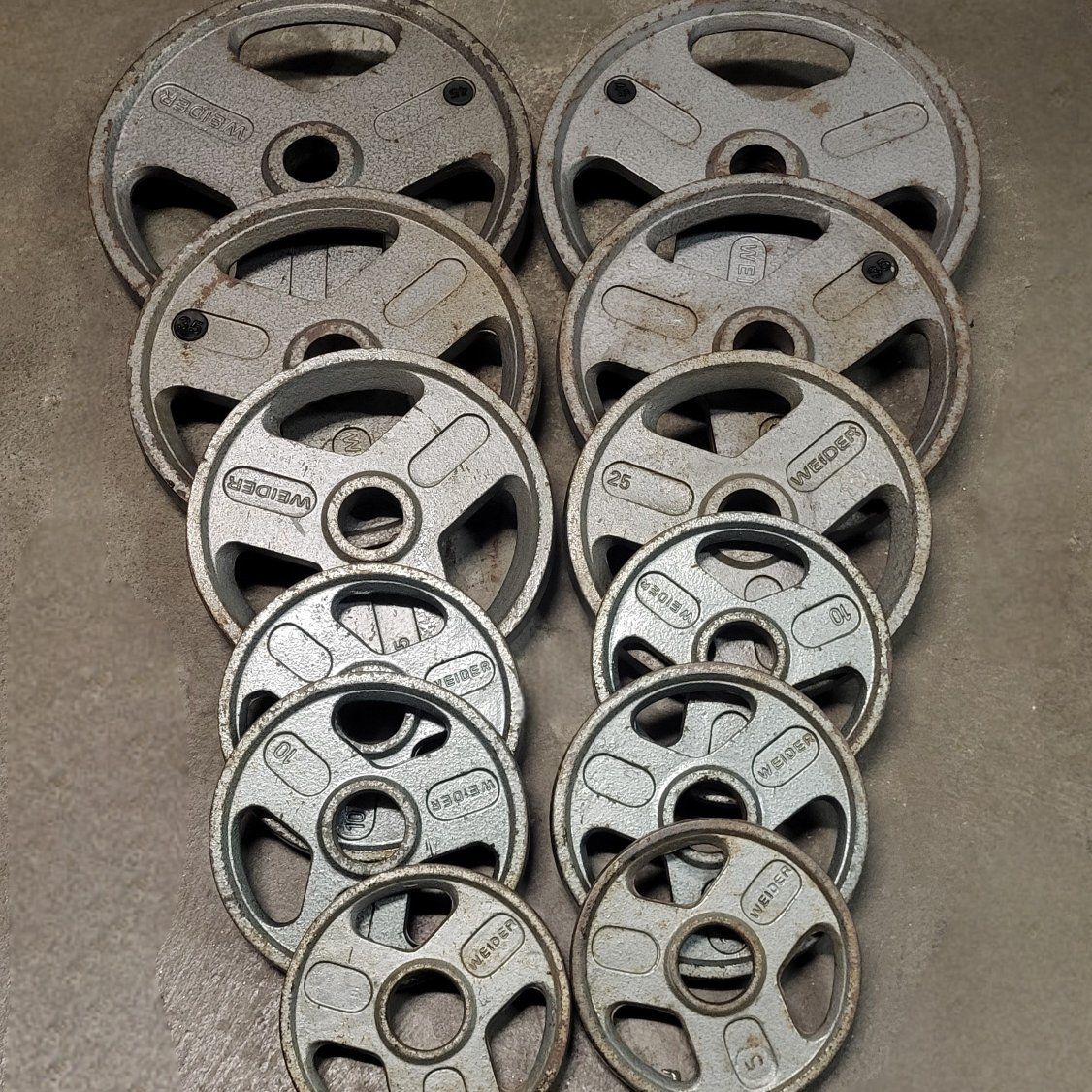 260 pounds of Olympic weights