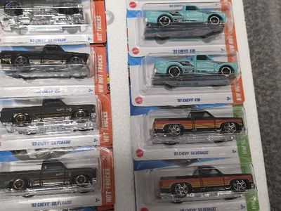 Hot Wheels '83 Chevy Silverado & '87 Chevy C10 Diecast Trucks - New, Unopened Condition