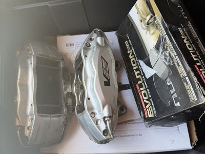 Front Brembo Cadillac CTS-V calipers rotors and pads