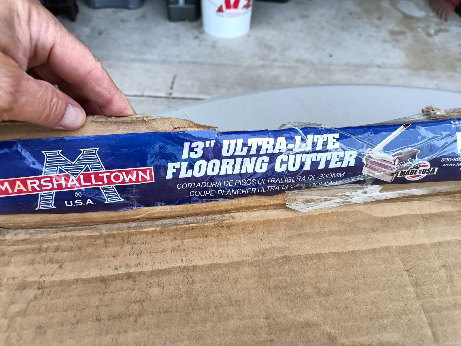 New in box flooring cutter. 13 inches wide.