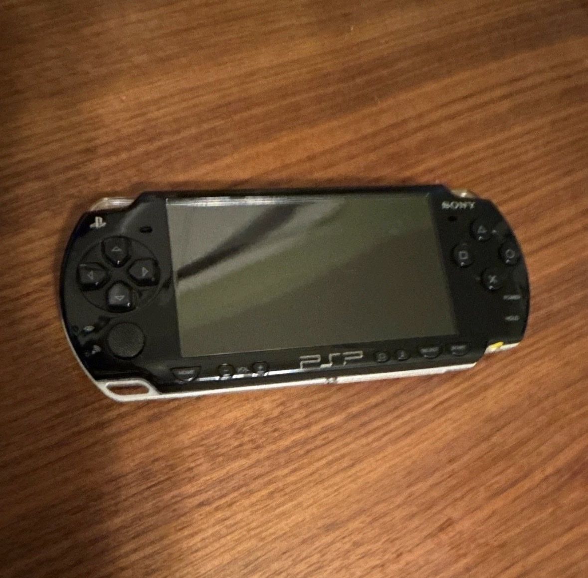 Sony PSP-2000 Wi-Fi Capability NEW battery, 64GB Memory