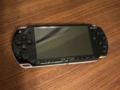 Sony PSP-2000 Wi-Fi Capability NEW battery, 64GB Memory