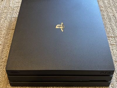 Sony PlayStation 4 Pro 1TB Console Bundle with 3 DualShock 4 Controllers, PS Move, Camera & 8 Games