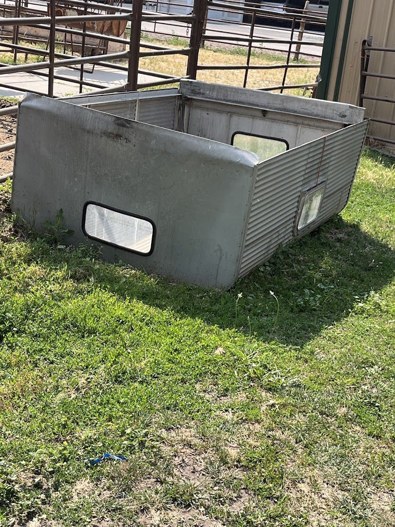 truck shell aluminum 59 inches wide X 89 inches long X 28 inches high    used back opens good fair shape