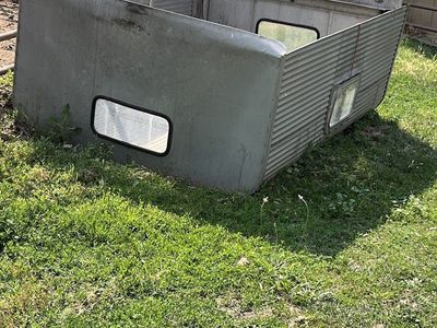 truck shell aluminum 59 inches wide X 89 inches long X 28 inches high used back opens good fair shape
