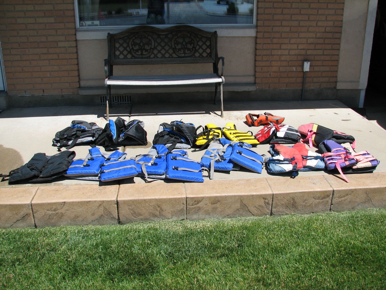 Various size and style life vests, Water lounge's, water tube and ski rope w/ gloves