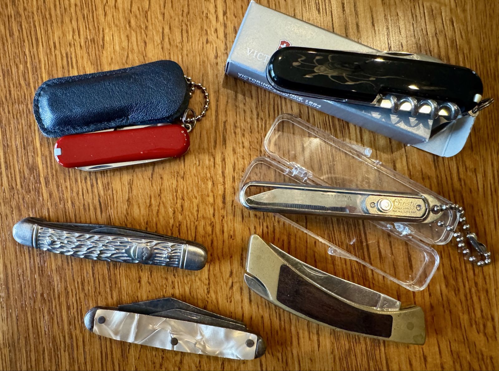 Lot of 6 Pocket Knives including 2 Swiss Army Knives, and others