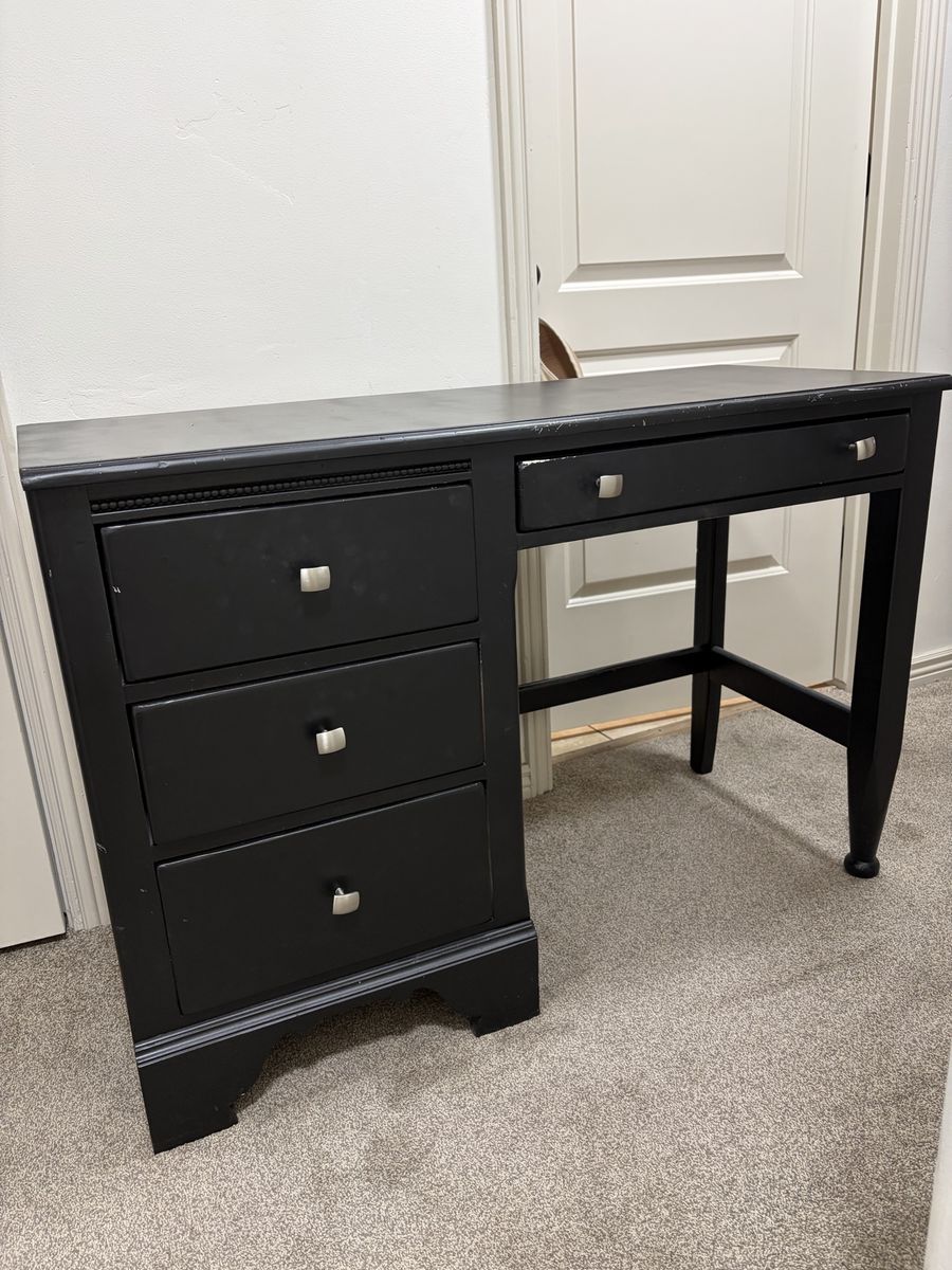 Black Wood Desk with 4 Drawers and Silver Knobs