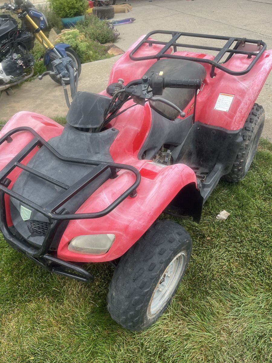 Suzuki Ozark 250 Red ATV Four Wheeler Utility Quad