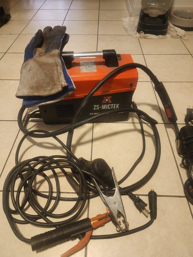 Welding Tool Lot: Tooliom Helmet, Angle Grinders, Reciprocating Saw & Welding Cables