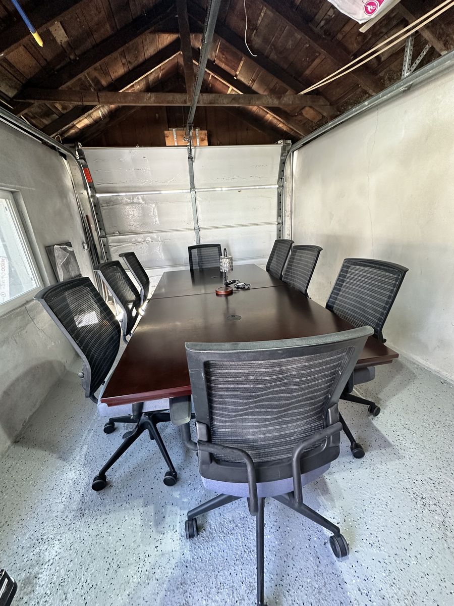Conference table retangular ruby 48x96 with 8 sit on it chairs