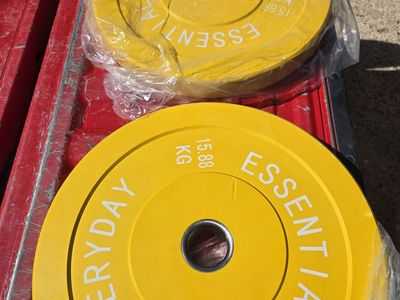 NEW 35 LB WEIGHT PLATES