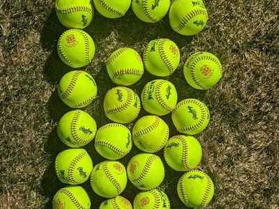 24 like new Rawlings Dream Seam 11" Softballs