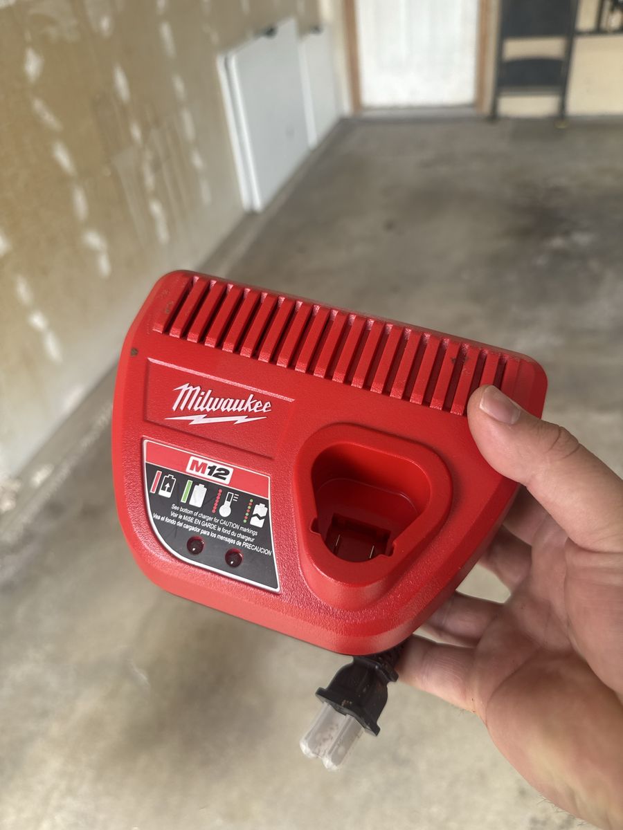 Milwaukee M12 Battery Charger - Power Tool Accessory - Red, Used