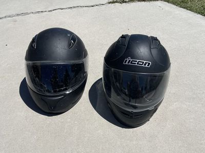 Two ICON Motorcycle Helmets - Black