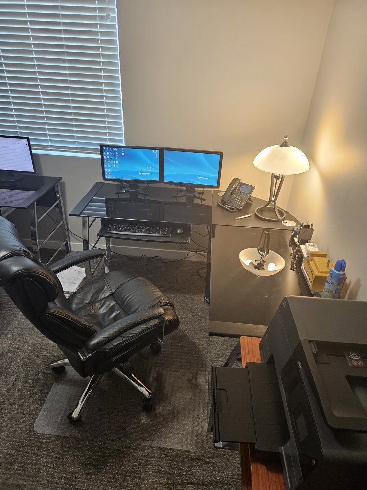 2 x Corner Office Smoke glass table, 2 x Black Leather Executive Office Chairs with High Back and 2x  H.D. carpet protector.