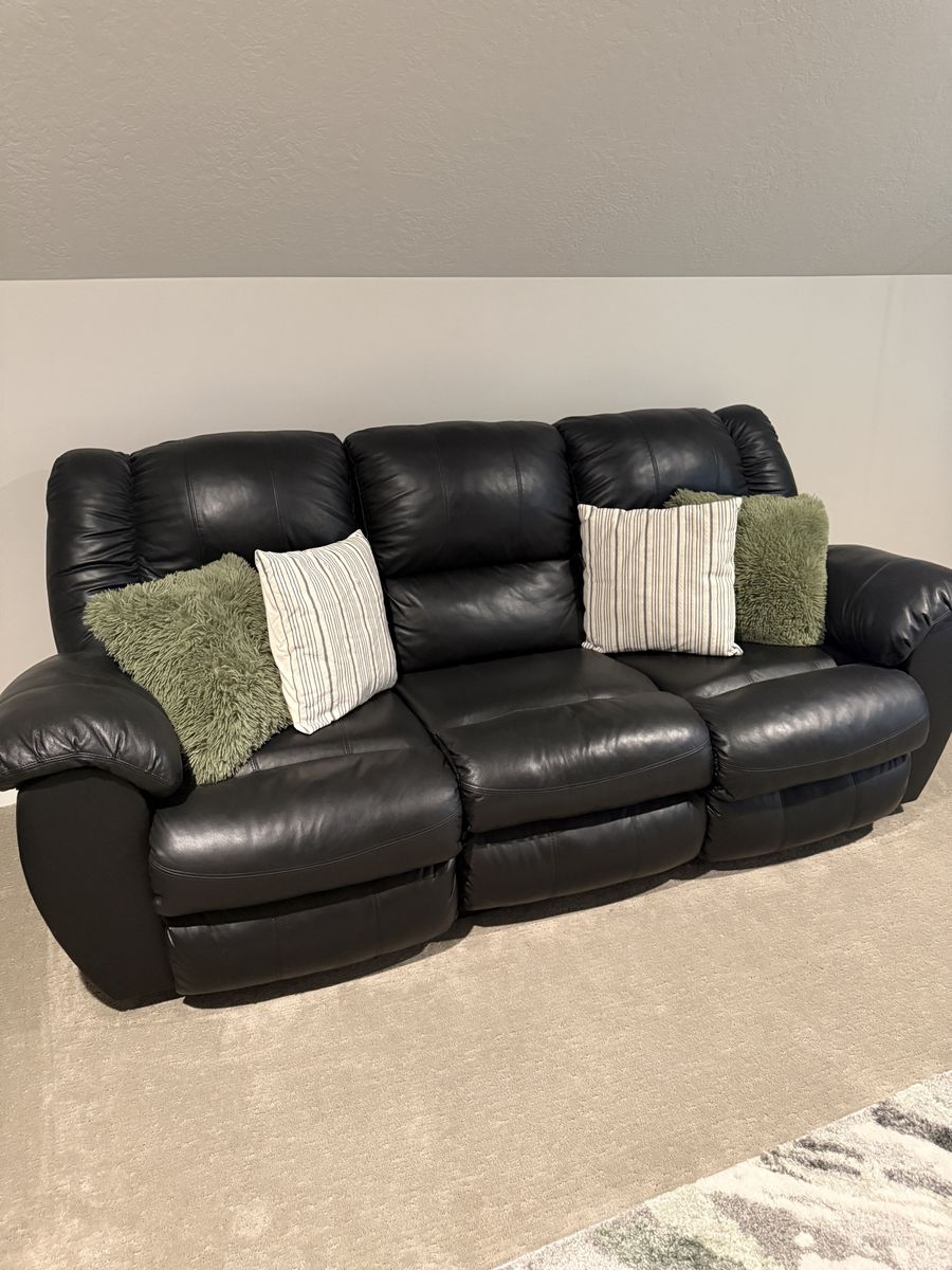 Leather reclining sofa