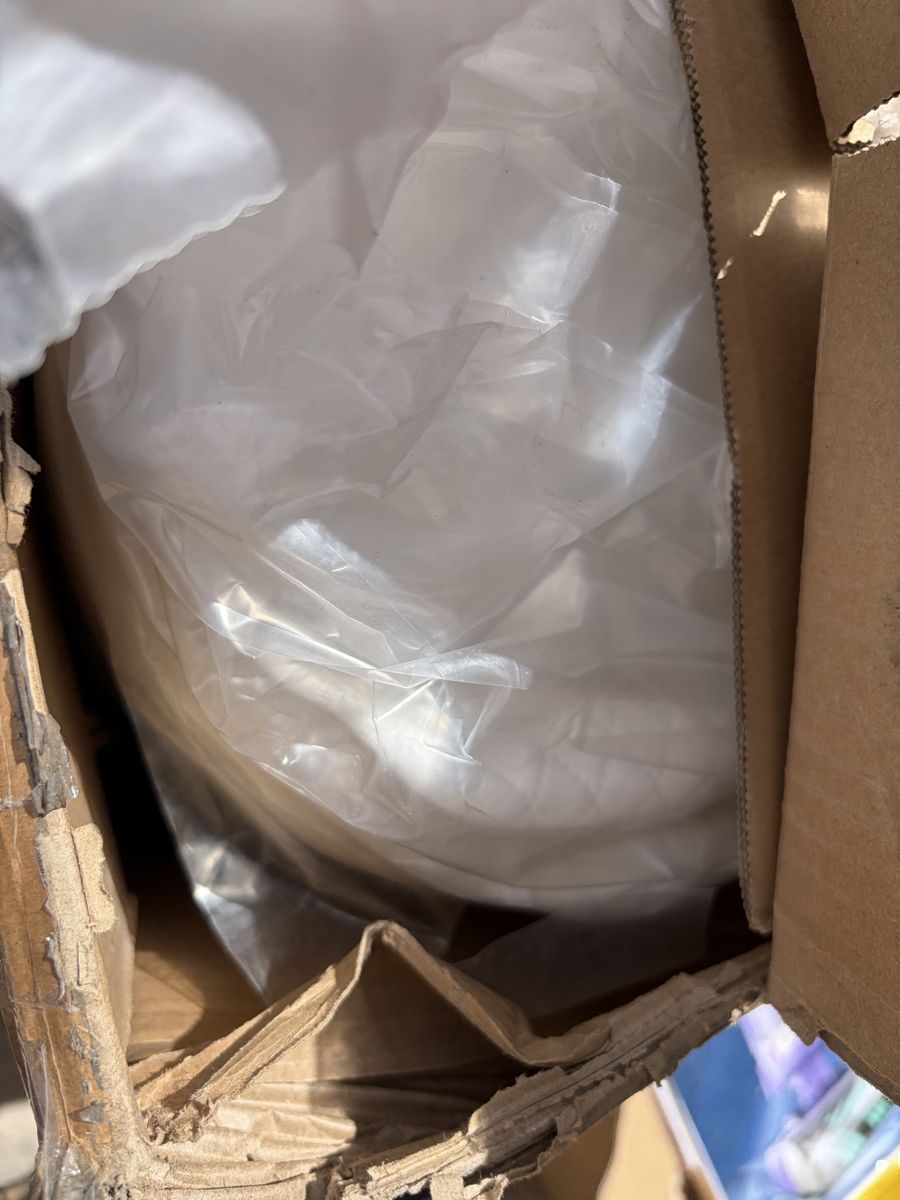 Title: New in Box: Rolled Mattress (Likely Twin Size)