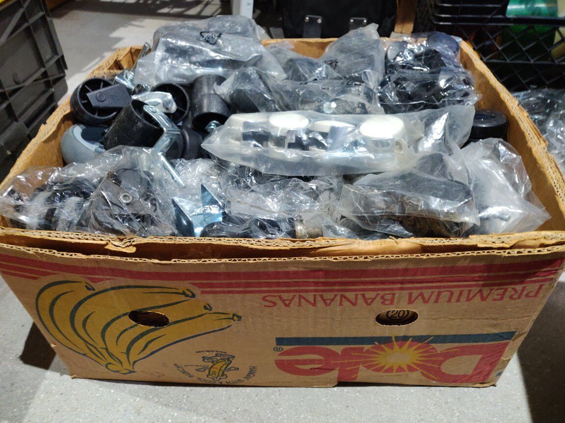 A Banana Box full+ of Misc Casters and Wheels