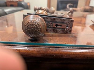 Antique door knobs and escutcheon plates set