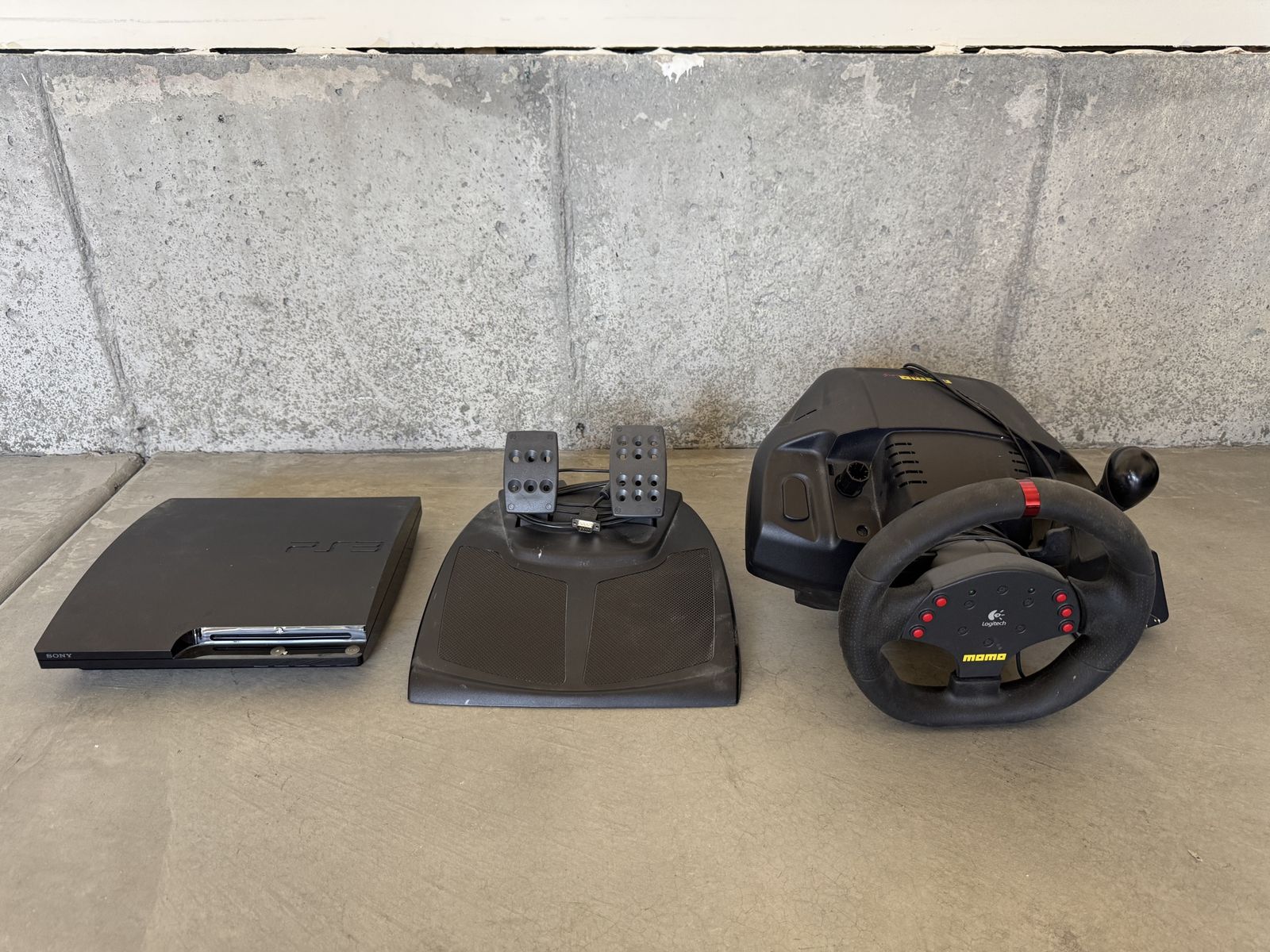 PlayStation 3 with pedals & Momo steering wheel
