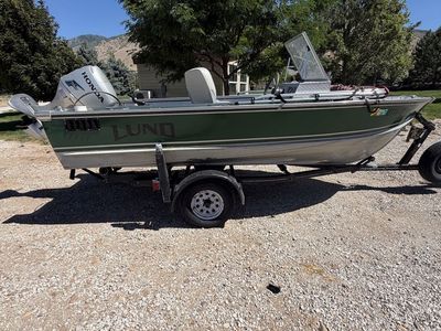 Lund Aluminum 16 foot v bottom Fishing Boat with Honda 2011 50hp 4-Stroke and Trailer and
