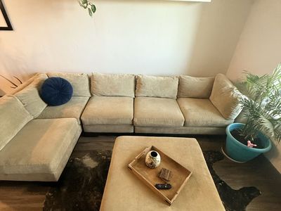 Spacious 4-Piece Sectional Sofa with Ottoman - neutral green Upholstery